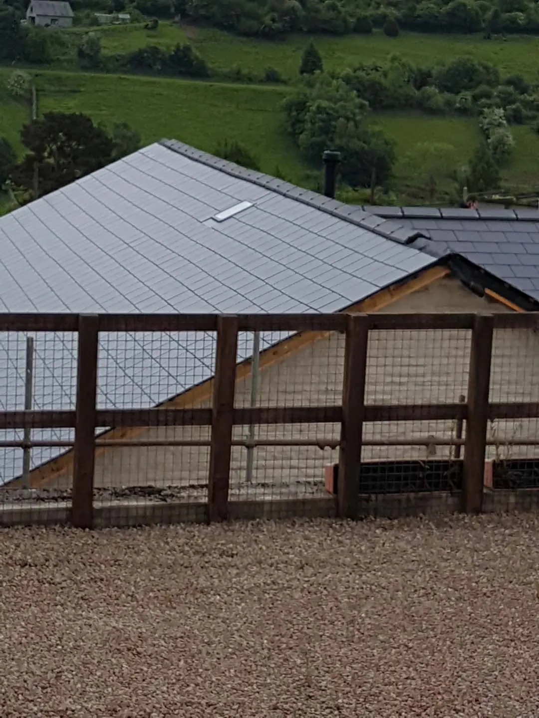 Finished slate roof with slim rooflight on a bungalow
